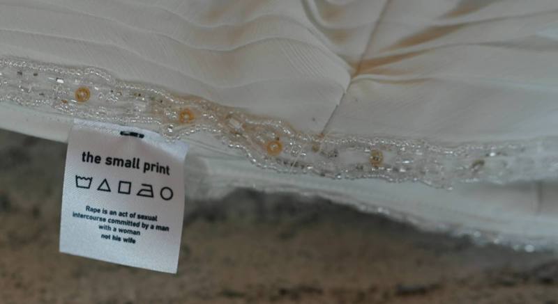 I'm fine: care label sewn into a beaded wedding dress hem